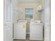 Laundry room with washer, dryer, and shelving at 182 Grand View Dr, New London, NC 28127