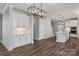 Modern kitchen with white cabinets, pendant lighting, and stainless steel appliances at 1852 Yardley St, Rock Hill, SC 29732