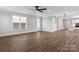 Open living area with hardwood floors, abundant natural light, and modern fixtures at 1852 Yardley St, Rock Hill, SC 29732