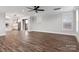 Spacious living room with hardwood flooring and modern lighting, flowing into the open kitchen at 1852 Yardley St, Rock Hill, SC 29732