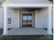 Covered patio with ceiling fan, providing a shaded outdoor space at 1852 Yardley St, Rock Hill, SC 29732