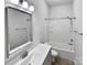 Clean bathroom with a bathtub, shower, and vanity at 1924 Felts Pkwy, Fort Mill, SC 29715