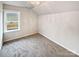 Bedroom with gray carpeting and a window at 1924 Felts Pkwy, Fort Mill, SC 29715