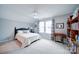 Serene bedroom with built-in shelving and window at 201 Picasso Trl, Mount Holly, NC 28120