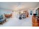 Bright craft room, well-lit with an island and storage at 201 Picasso Trl, Mount Holly, NC 28120