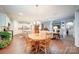 Kitchen and dining area with hardwood floors at 201 Picasso Trl, Mount Holly, NC 28120