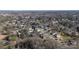 Expansive aerial view of a residential neighborhood with mature trees at 202 Cedar St, Belmont, NC 28012