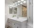 Bright bathroom features double mirrors and a white vanity providing plenty of counter space at 209 Choate Ave, Fort Mill, SC 29708