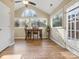 Cozy breakfast nook features natural light, vaulted ceiling, and views of backyard at 209 Choate Ave, Fort Mill, SC 29708