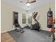 Spacious workout room with gym equipment and soft floors offers space for home fitness at 209 Choate Ave, Fort Mill, SC 29708