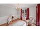 Cozy dining room with bright window and elegant chandelier at 2213 Genesis Dr, Monroe, NC 28110