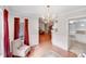 Bright dining room features hardwood floors, chair rail, and a chandelier at 2213 Genesis Dr, Monroe, NC 28110