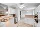 Spacious kitchen features white appliances, and tile flooring at 2213 Genesis Dr, Monroe, NC 28110