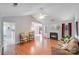 Bright living room with fireplace, hardwood floors, and neutral tones at 2213 Genesis Dr, Monroe, NC 28110