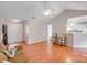 Bright living area with an open view to the kitchen and entry at 2213 Genesis Dr, Monroe, NC 28110