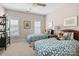 Inviting bedroom with two twin beds, decorated with whimsical patterns and natural light at 2218 Croydon Rd, Charlotte, NC 28207