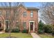 Charming two-story red brick home with a manicured front yard and inviting entrance at 2218 Croydon Rd, Charlotte, NC 28207