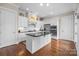 Modern kitchen with stainless steel appliances, granite countertops, and ample cabinet space at 2218 Croydon Rd, Charlotte, NC 28207