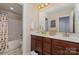 Shared bathroom with double vanity and tub shower combo at 232 Morgans Branch Rd, Belmont, NC 28012