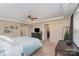 Spacious primary bedroom with ample natural light and ceiling fan at 232 Morgans Branch Rd, Belmont, NC 28012