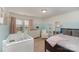 Charming bedroom with light blue walls and a crib at 232 Morgans Branch Rd, Belmont, NC 28012