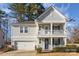 Two-story house with gray siding, a two-car garage, and a front porch at 232 Morgans Branch Rd, Belmont, NC 28012