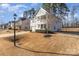 Two-story house with gray siding, a two-car garage, and a front porch at 232 Morgans Branch Rd, Belmont, NC 28012