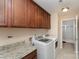 Laundry room with washer, dryer, and upper cabinets at 232 Morgans Branch Rd, Belmont, NC 28012