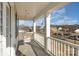 Covered porch with a swing overlooking the neighborhood at 232 Morgans Branch Rd, Belmont, NC 28012