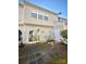 Rear exterior view showing patio and storage area at 2711 Thornbush Ct, Charlotte, NC 28270