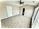 Large main bedroom with carpeted floors and access to the bathroom at 2711 Thornbush Ct, Charlotte, NC 28270