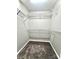 Large walk-in closet with wire shelving and carpeted floor at 2711 Thornbush Ct, Charlotte, NC 28270