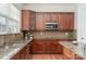 Spacious kitchen with granite countertops, stainless steel appliances, and ample cabinet space at 3013 Misty Moss Ct, Waxhaw, NC 28173