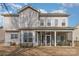 Spacious home featuring a large screened porch and expansive windows overlooking the backyard at 3013 Misty Moss Ct, Waxhaw, NC 28173