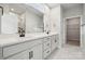 Double vanity bathroom with marble floor and walk-in shower at 3209 Whispering Creek Dr, Indian Trail, NC 28079