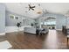 Spacious community room with hardwood floors and large windows at 3209 Whispering Creek Dr, Indian Trail, NC 28079