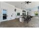 Outdoor kitchen area with a granite countertop and seating at 3209 Whispering Creek Dr, Indian Trail, NC 28079