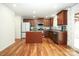 Modern kitchen featuring an island, stainless steel appliances, and wood cabinets at 4182 Cordell Ct, Midland, NC 28107