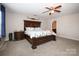 Large main bedroom with ceiling fan and ensuite bathroom at 4182 Cordell Ct, Midland, NC 28107