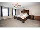 Large main bedroom with ceiling fan and ensuite bathroom at 4182 Cordell Ct, Midland, NC 28107