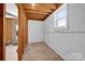 Unfinished basement area with a window and ample storage space at 421 Wood Bridge Rd, Statesville, NC 28625