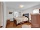 Simple bedroom with a double bed and light colored walls at 421 Wood Bridge Rd, Statesville, NC 28625