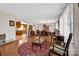 Dining room with hardwood floors and vintage furniture at 421 Wood Bridge Rd, Statesville, NC 28625