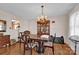 Dining room with hardwood floors and a chandelier at 421 Wood Bridge Rd, Statesville, NC 28625