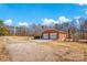 Two-car brick garage with white doors at 421 Wood Bridge Rd, Statesville, NC 28625