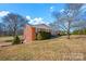 Brick ranch house with side yard and landscaping at 421 Wood Bridge Rd, Statesville, NC 28625