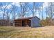 Rustic wooden barn with rusted metal roof at 421 Wood Bridge Rd, Statesville, NC 28625