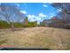 Large grassy yard with mature trees at 421 Wood Bridge Rd, Statesville, NC 28625