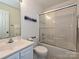 Clean bathroom with a shower/tub combo and vanity at 4211 Suttle Pl, Matthews, NC 28104