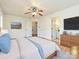 Spacious bedroom with wood floors and ceiling fan at 4211 Suttle Pl, Matthews, NC 28104